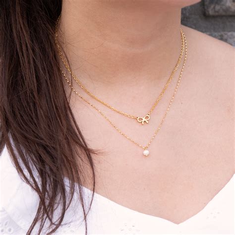 Ketting parel Louis Vuitton goud in Parel 